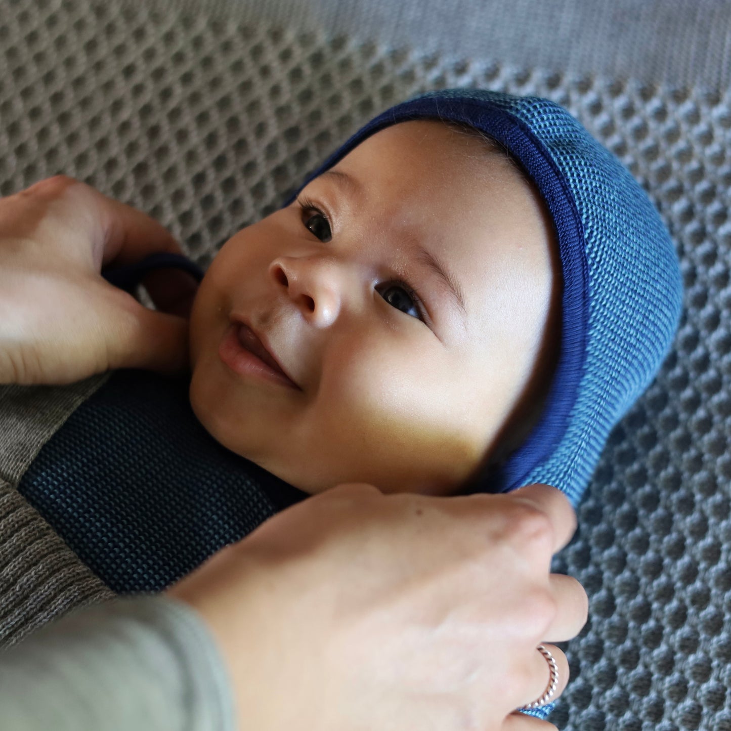 Bonnet pour bébé Disana, laine mélangée tricotée
