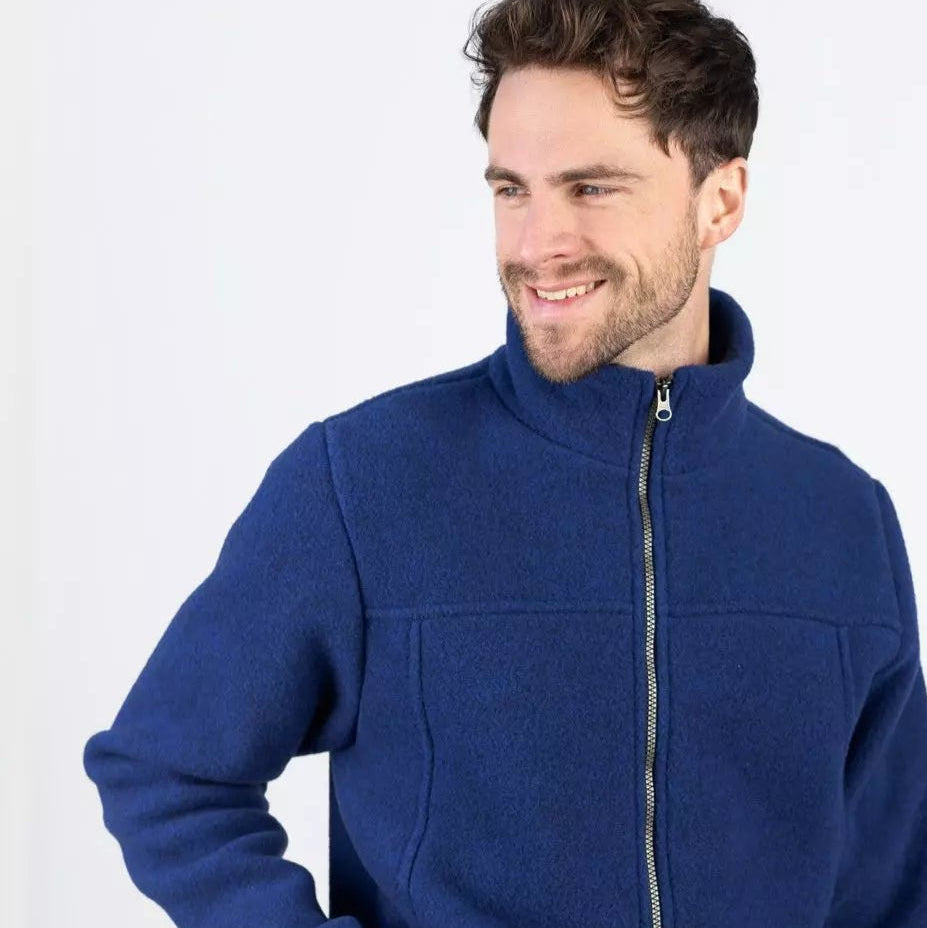 Man wearing a blue jacket on a white background