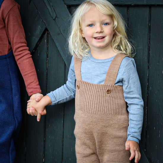 Pantalon bébé/jeune enfant Disana avec bretelles, en laine mérinos tricotée